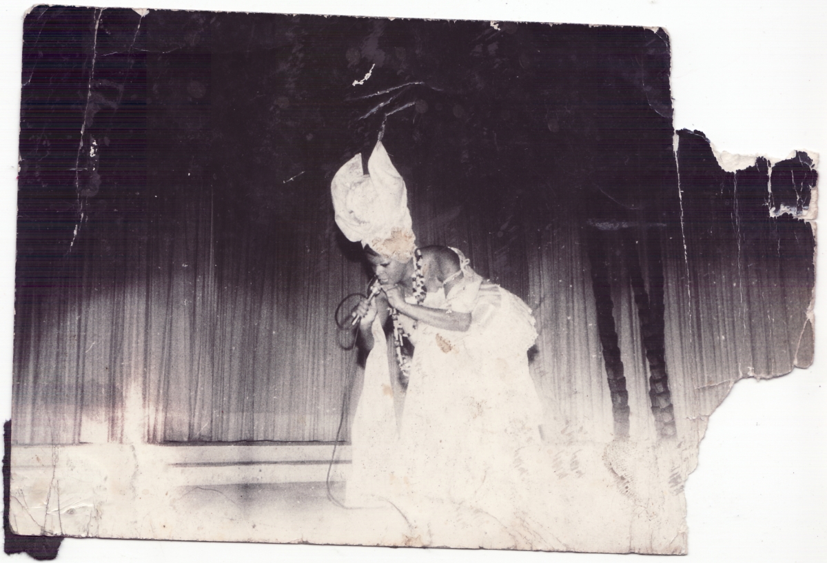 Veronica Garcia dressed as a santera on stage. Photographed by “Archivo Sierra Maestra.”Santiago, Cuba. 1970s. Silver gelatin print.